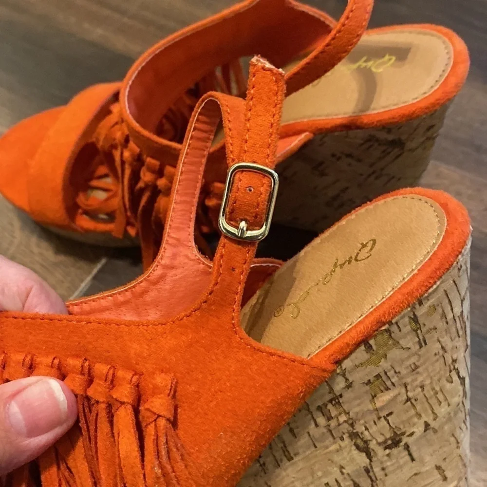 QUPID burnt orange suede fringe wedges.